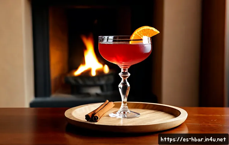 홈바텐더 겨울 칵테일 - Photorealistic cozy winter home bar scene for a Spanish household, a clear coupe glass holding a dee...